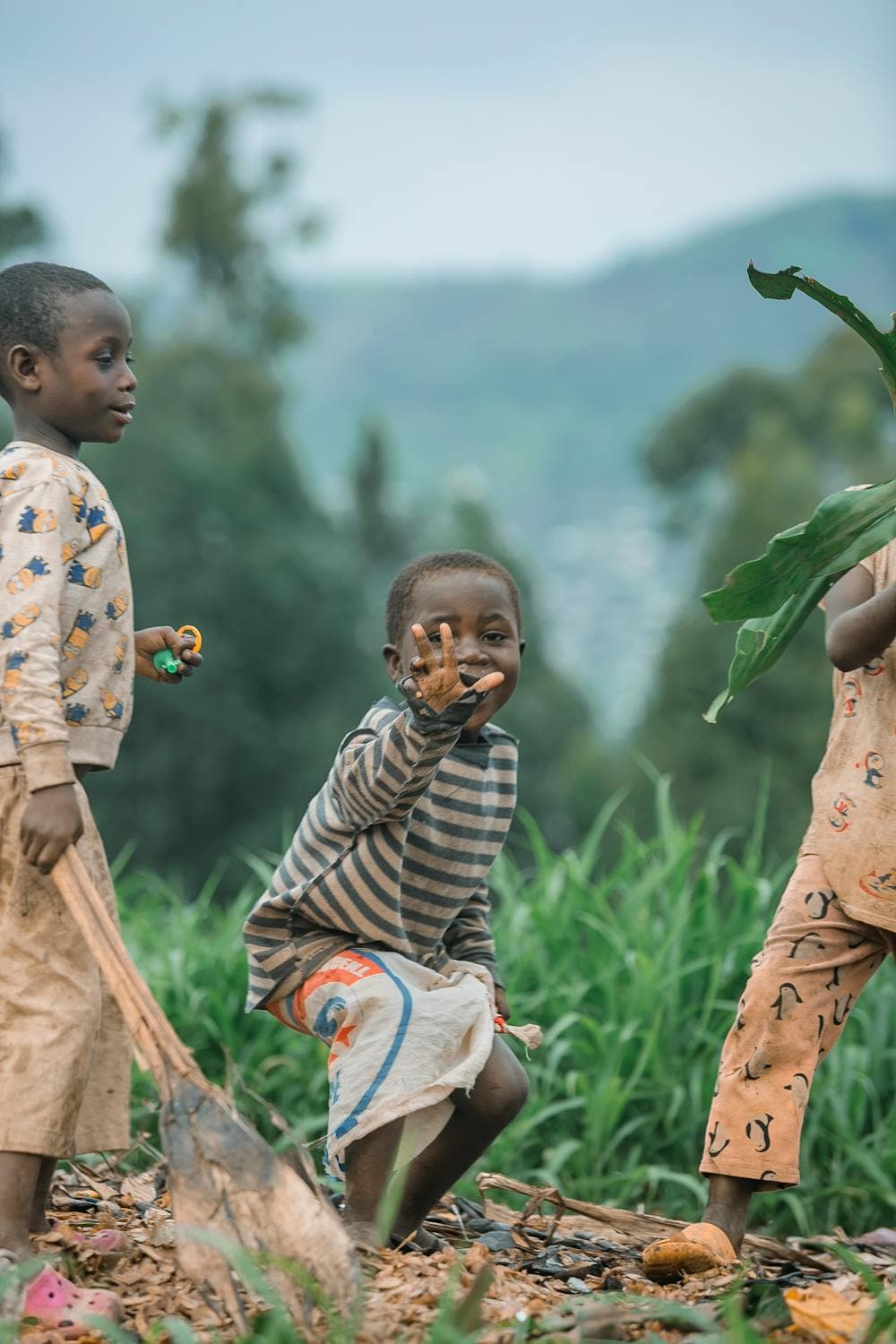 Joyful children playing outdoors together in a sunny natural setting